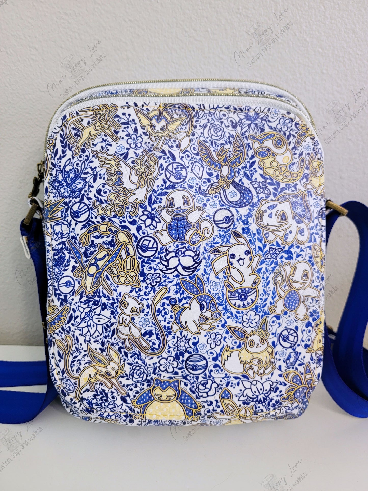 Widget Messenger Bag: Blue Poke Lace