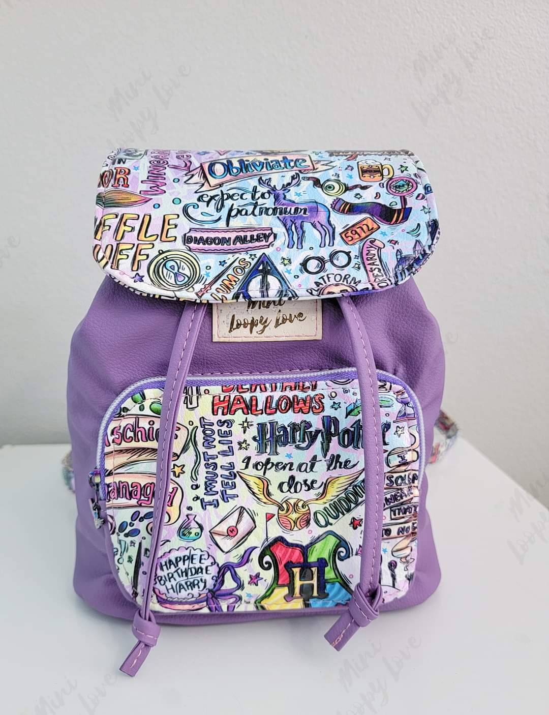 Alice Bucket Backpack: HP Words